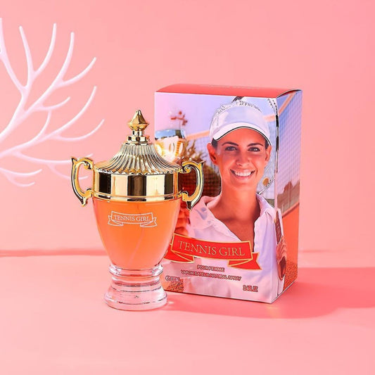 Tennis-themed product with a gold cup and packaging featuring a tennis player on a pink background