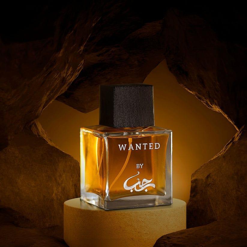 Perfume bottle labeled 'Wanted' by a brand on a dark background