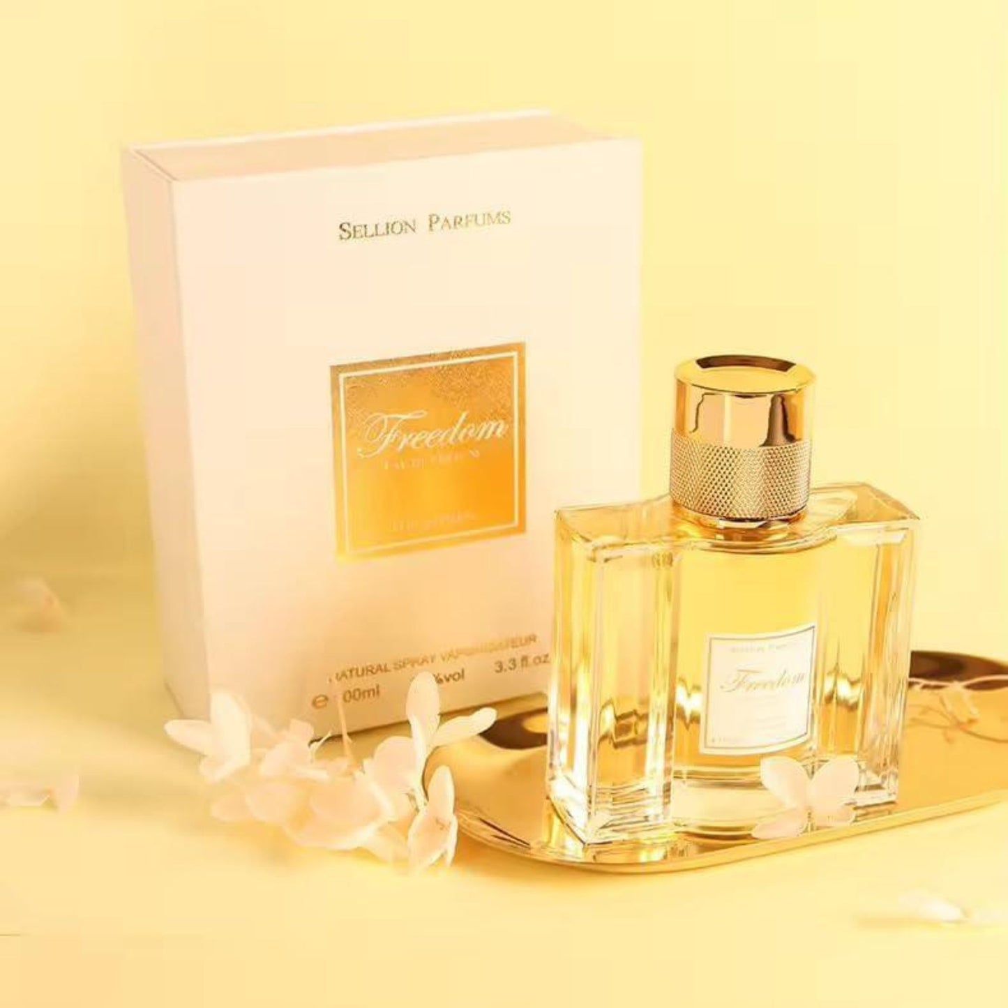 Perfume bottle and packaging with 'Sellaun Parfums' branding on a yellow background