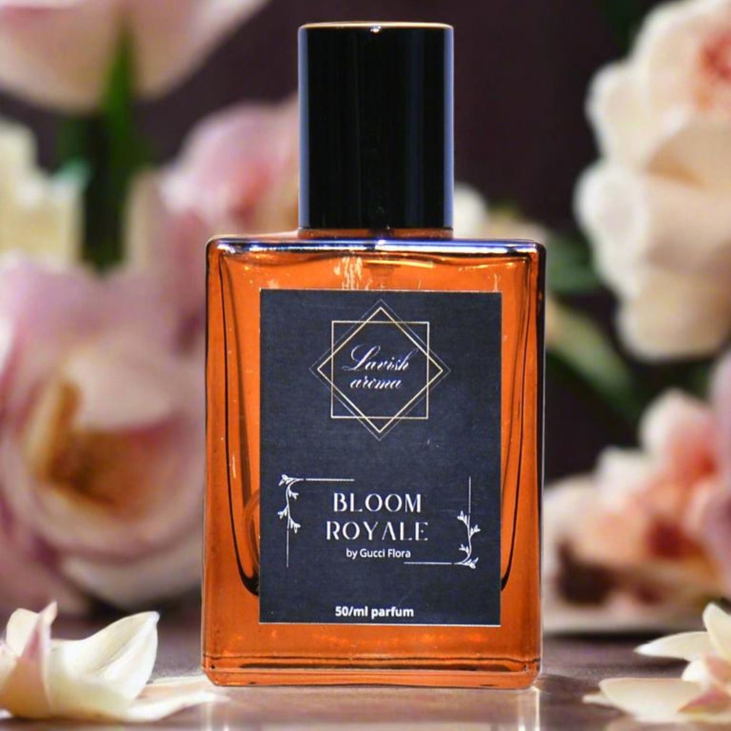 Perfume bottle labeled 'Bloom Royale' by Gucci Flora with flowers in the background